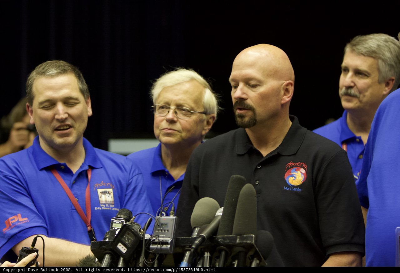 Press Conference with Blue-Shirted Men
