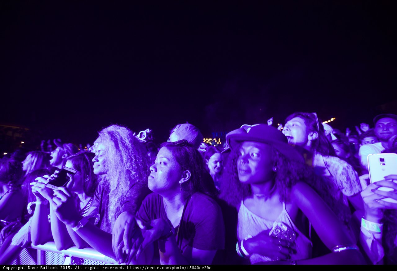 Front Row Fans Eyes Closed Hat Singing Behind