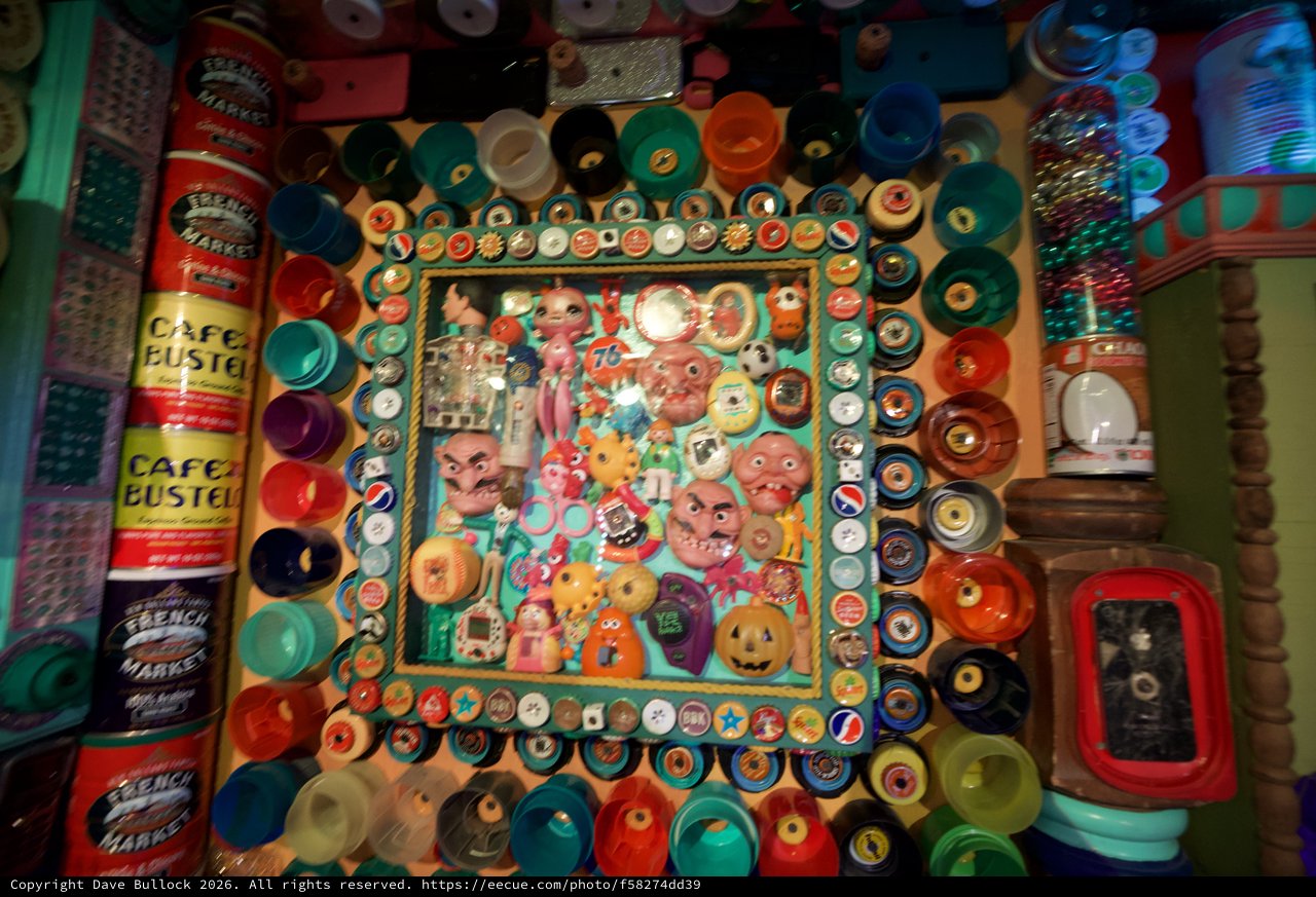 Eclectic Folk Art Collage with Bottle Caps and Vintage Toys