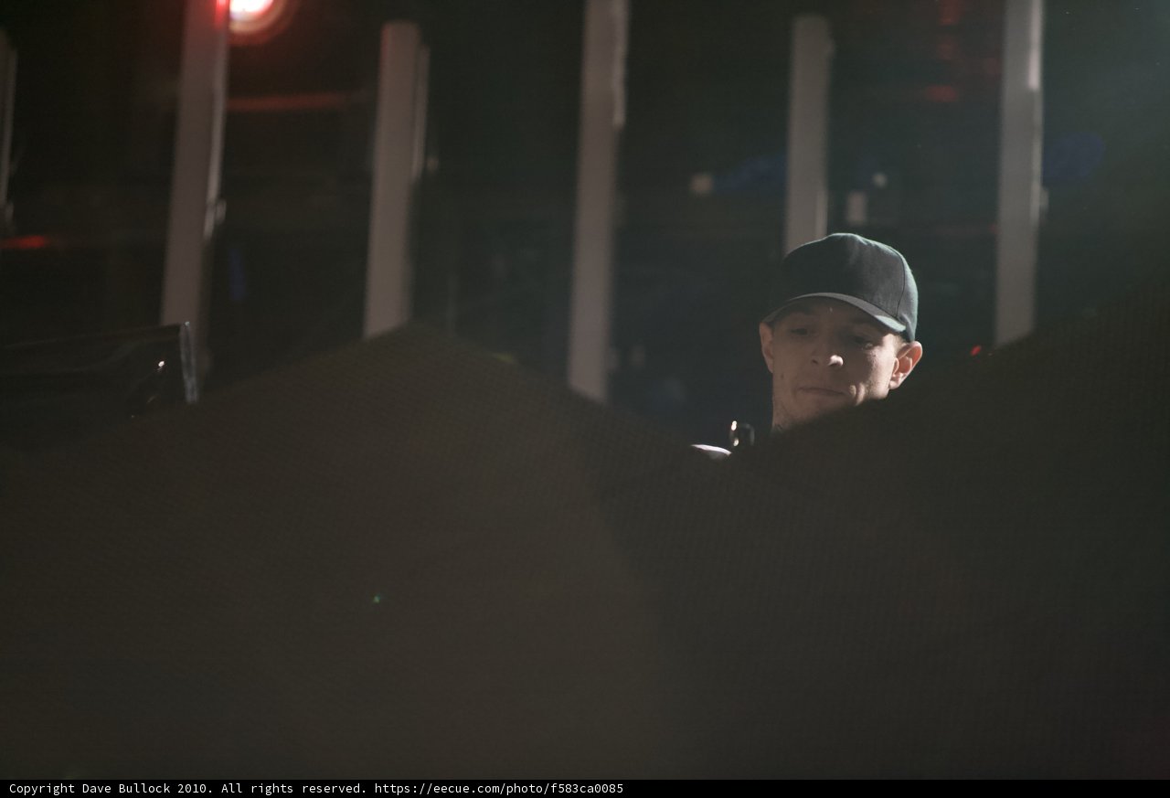 Baseball cap guy on stage