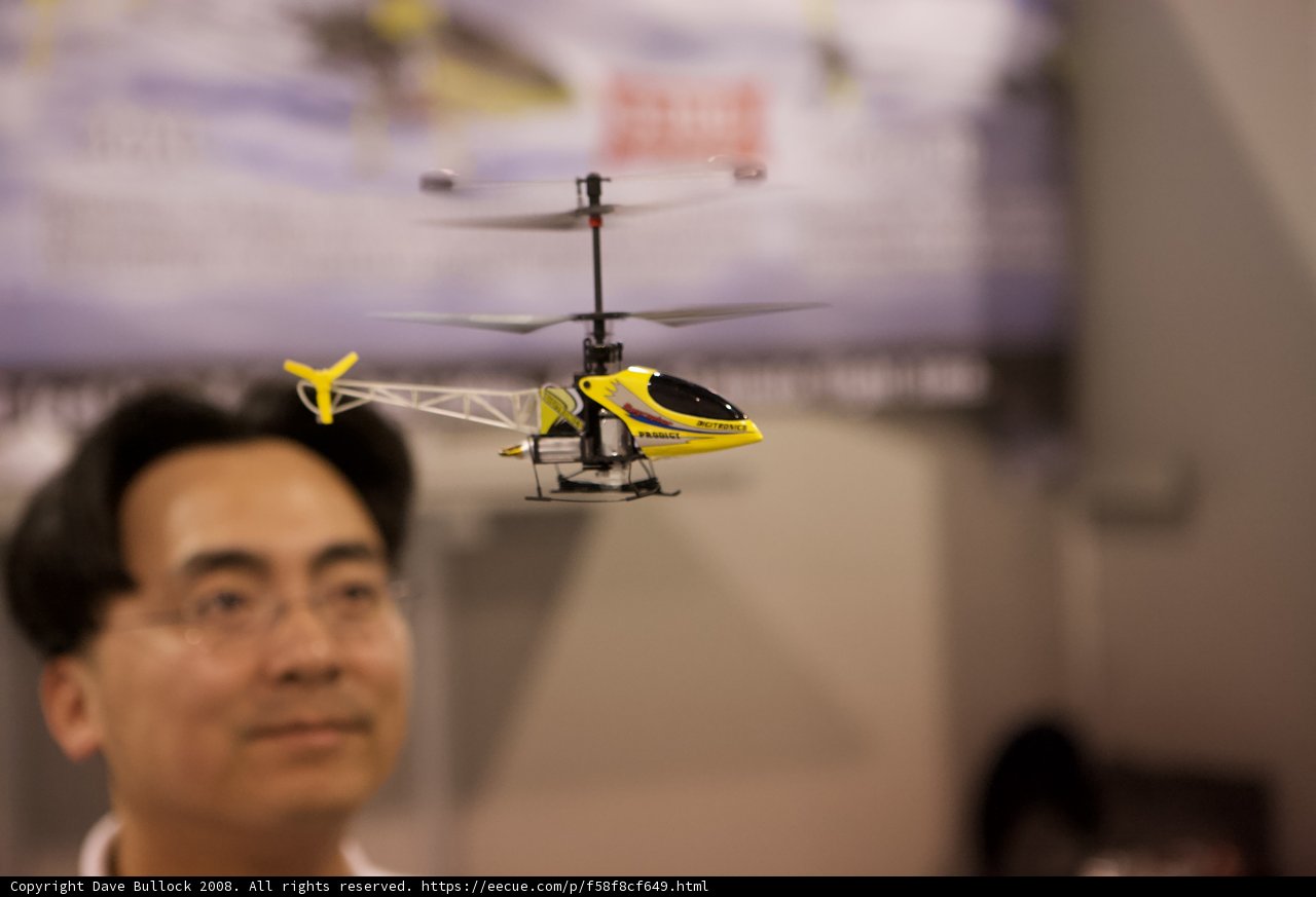 A Man and His Helicopter Toy