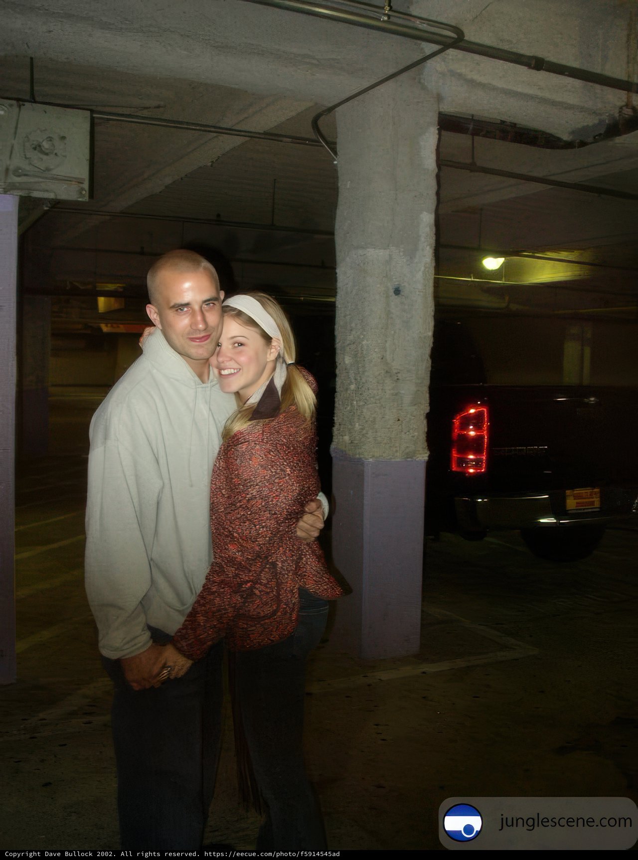 Embrace in the Parking Garage