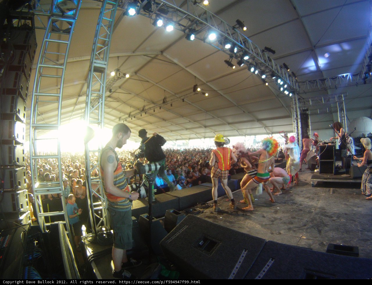 Stage Lights Illuminate Concert Crowd