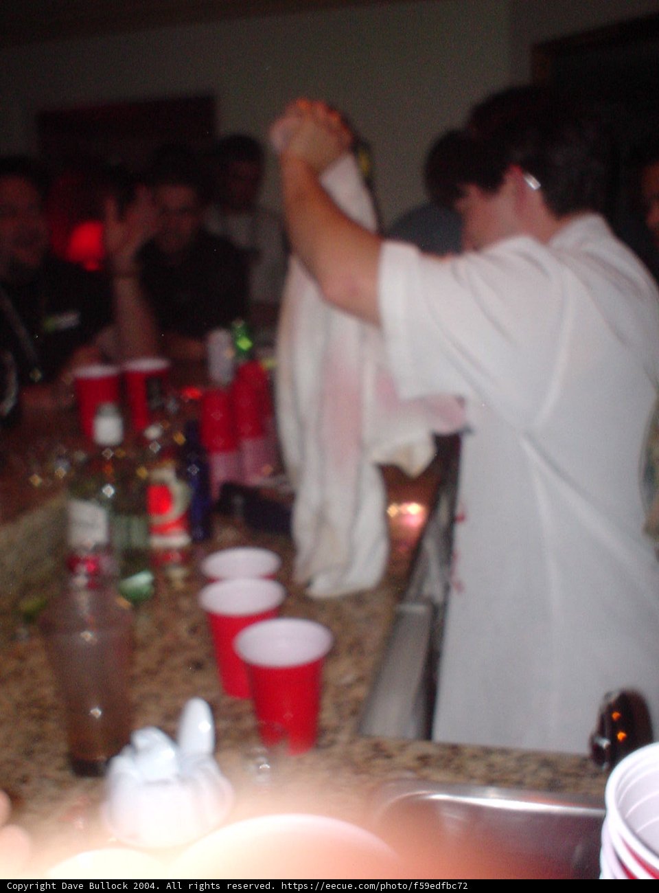 Towel-Wielding Drinkers at Urban Pub
