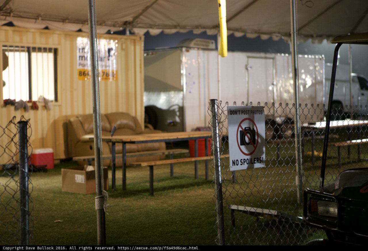 Golf Cart Takes a Breather Under the Tent