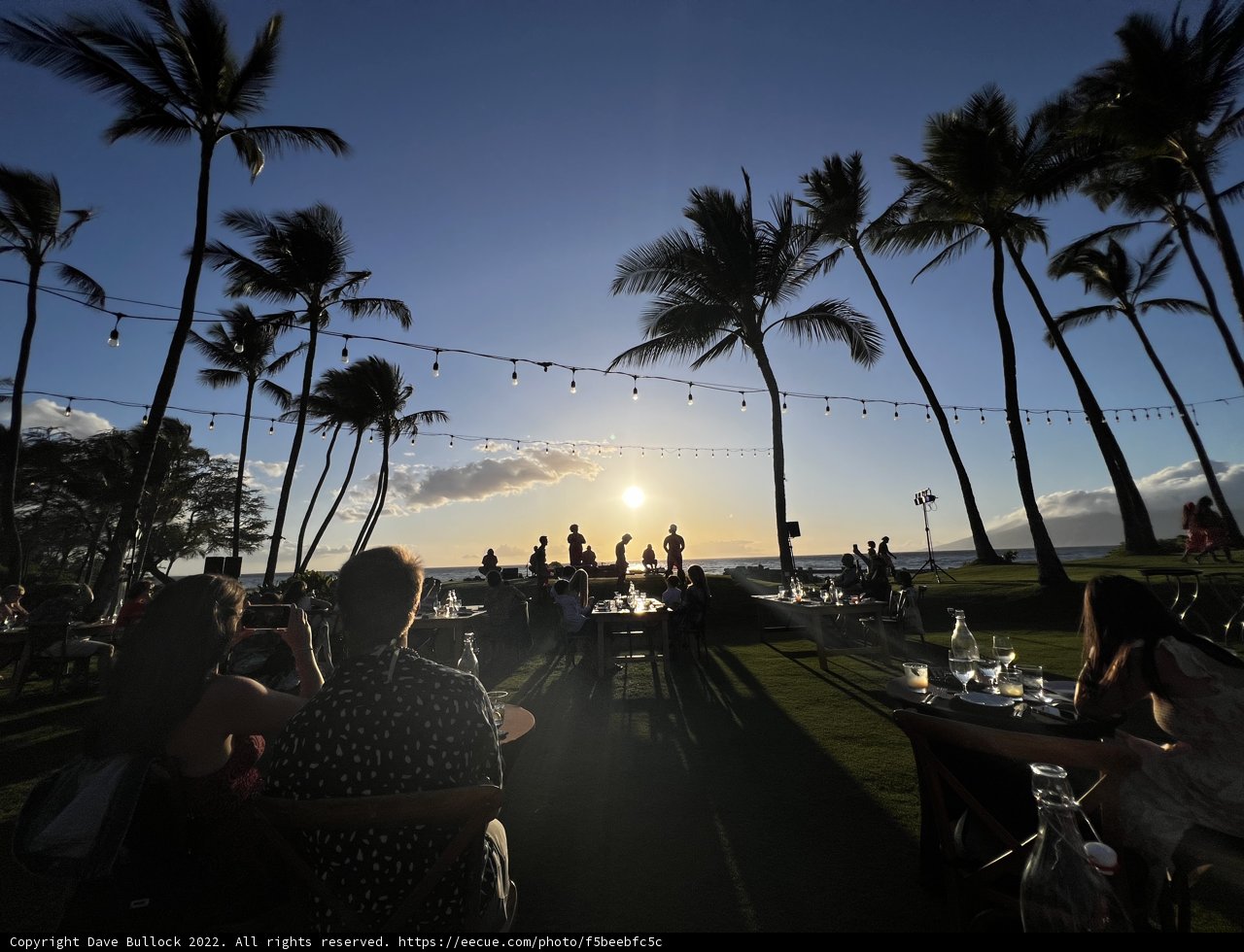 Sunset Dining at an Outdoor Hawaiian Restaurant