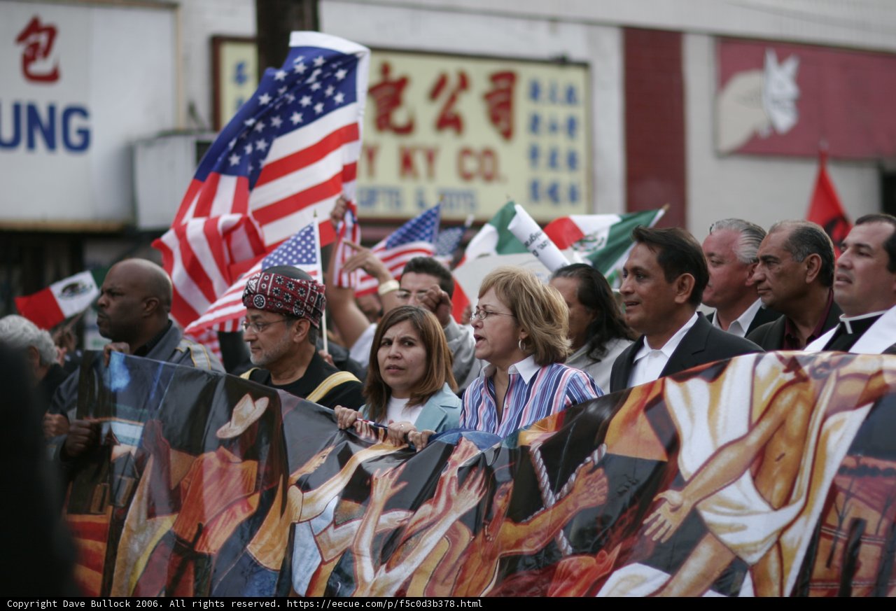 Parade of People with Flags and Banners