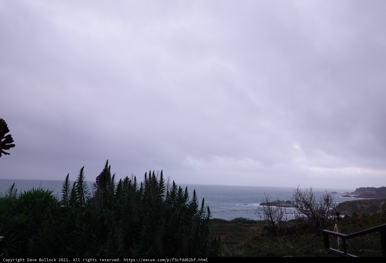 Majestic View of the Ocean and Clouds from a Hilltop