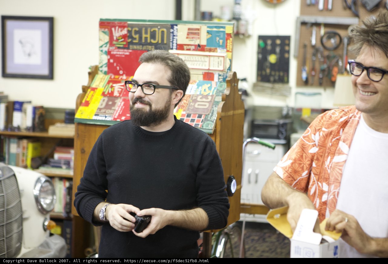 Two Men in a Room Full of Treasures