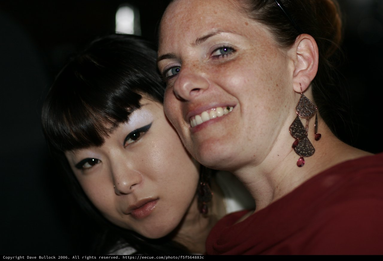 Two Friends Share a Close Moment at Night