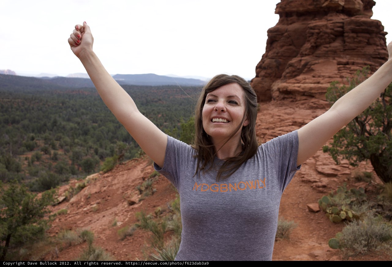 Triumphant Hiker Celebrates Atop Sedona Red Rocks