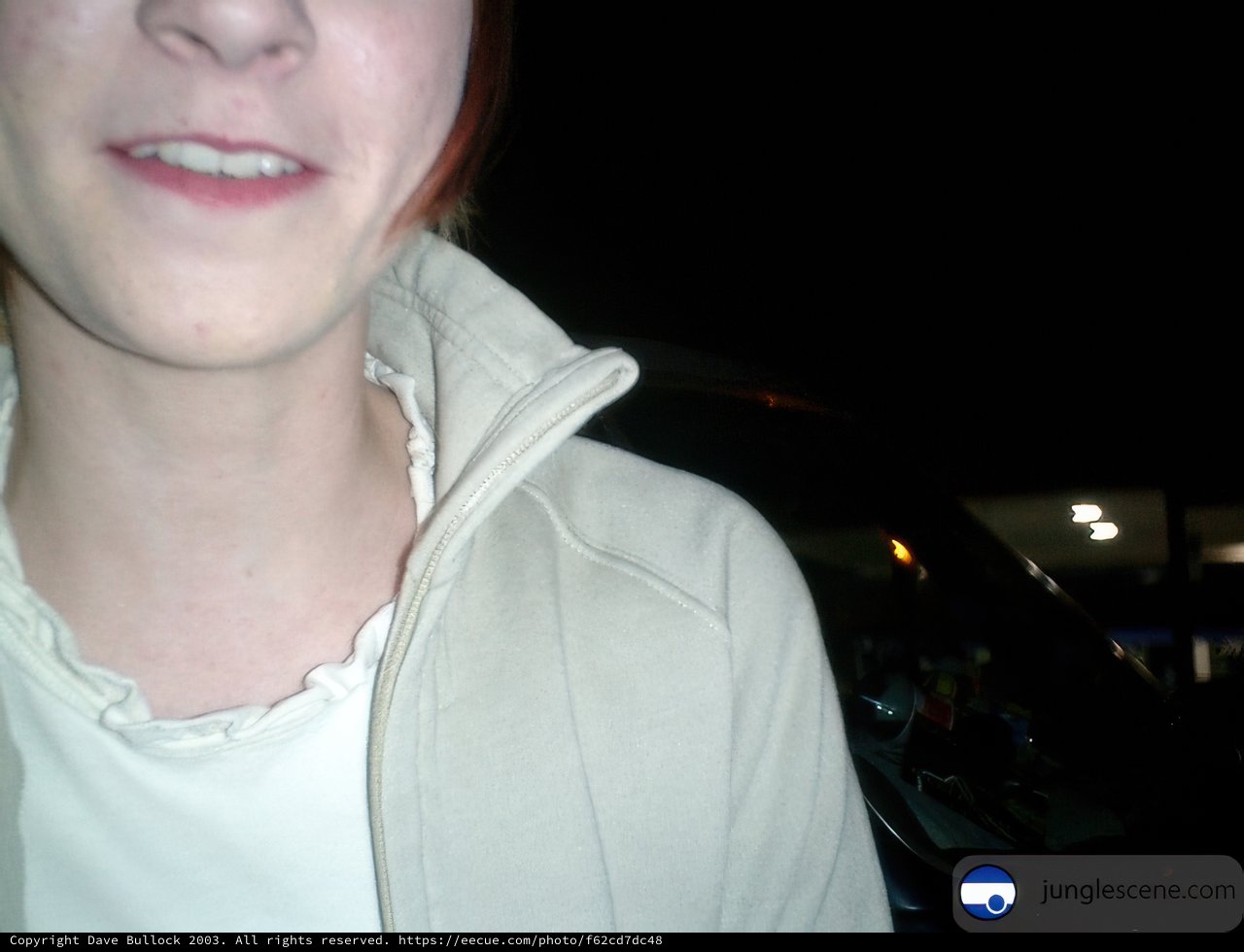 The Smiling Redhead in a Cozy Coat