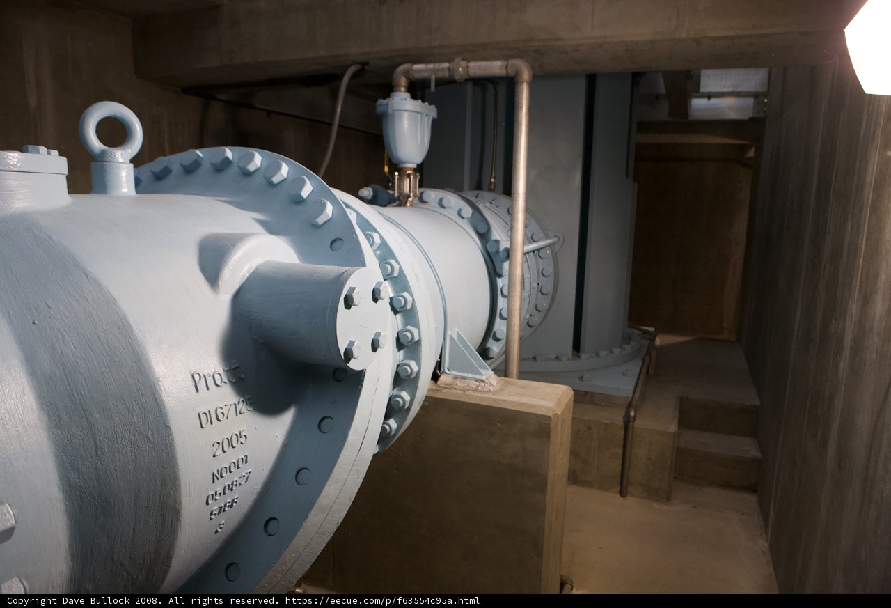 Spiraling Blue Pipe in Industrial Setting