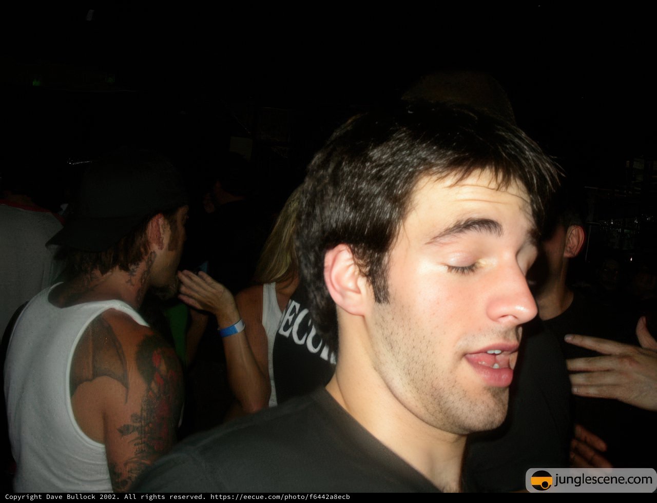 Tattooed Man at the Club