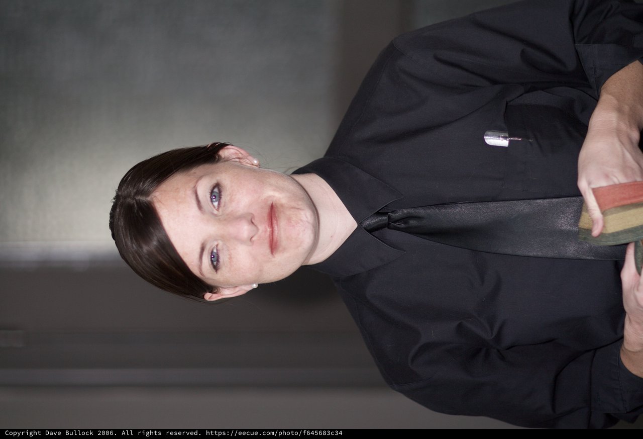 Professional Woman in Black Uniform Portrait
