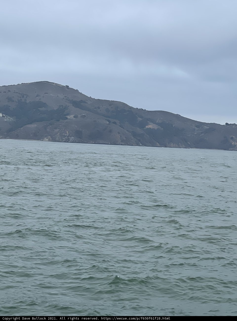 Serene Sailboat Promontory