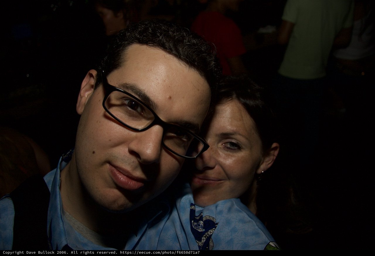Late Night Candid Portrait Duo at Dark Venue