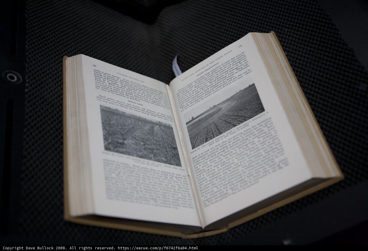 Open Book on Black Table