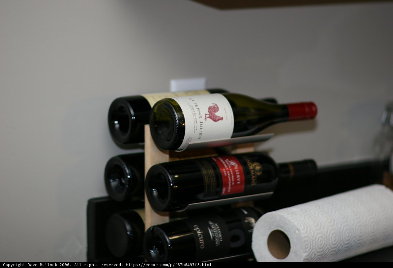 A Bottle of Wine Ready to be Uncorked