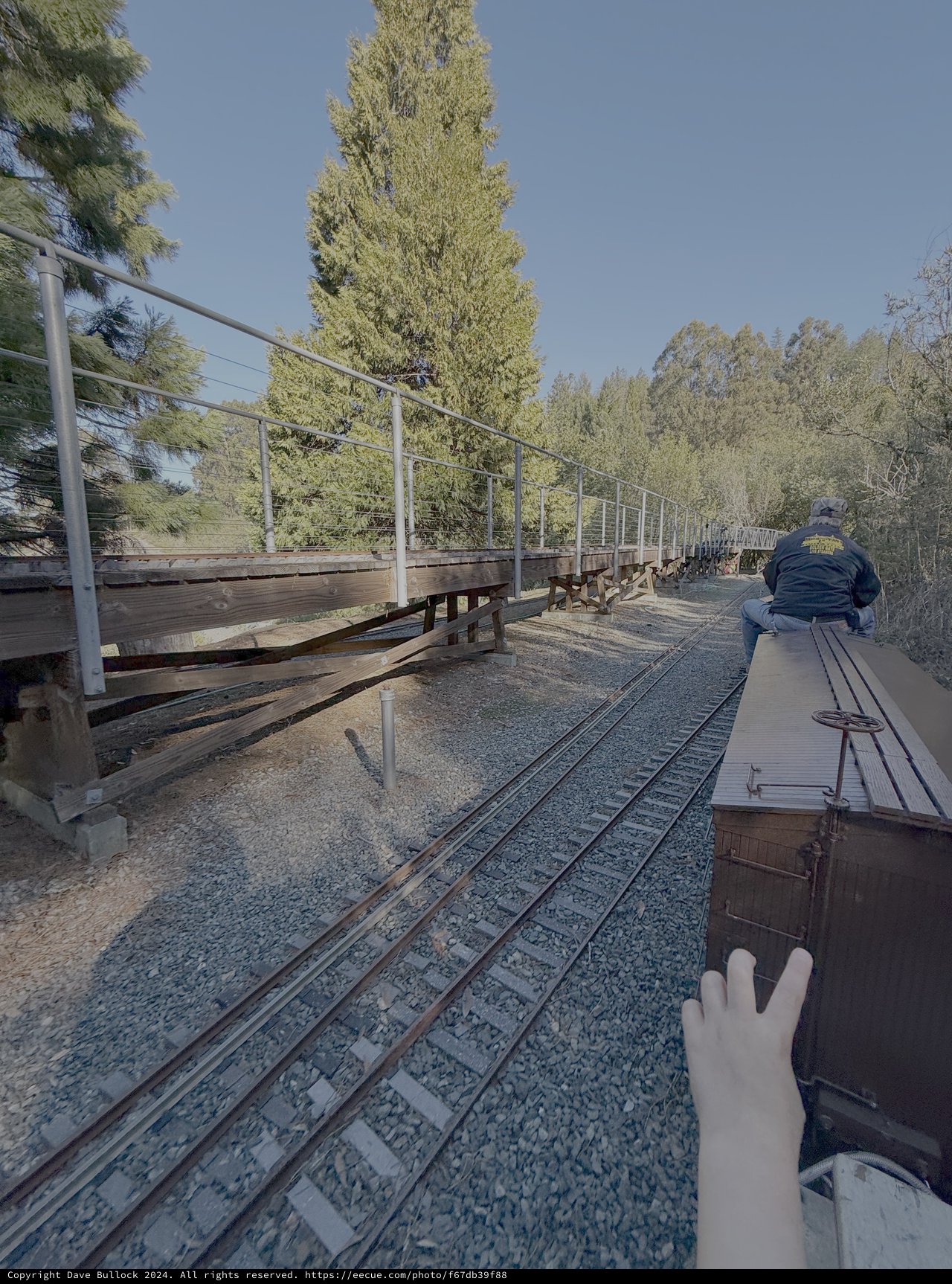 Railway Worker on Active Train Tracks