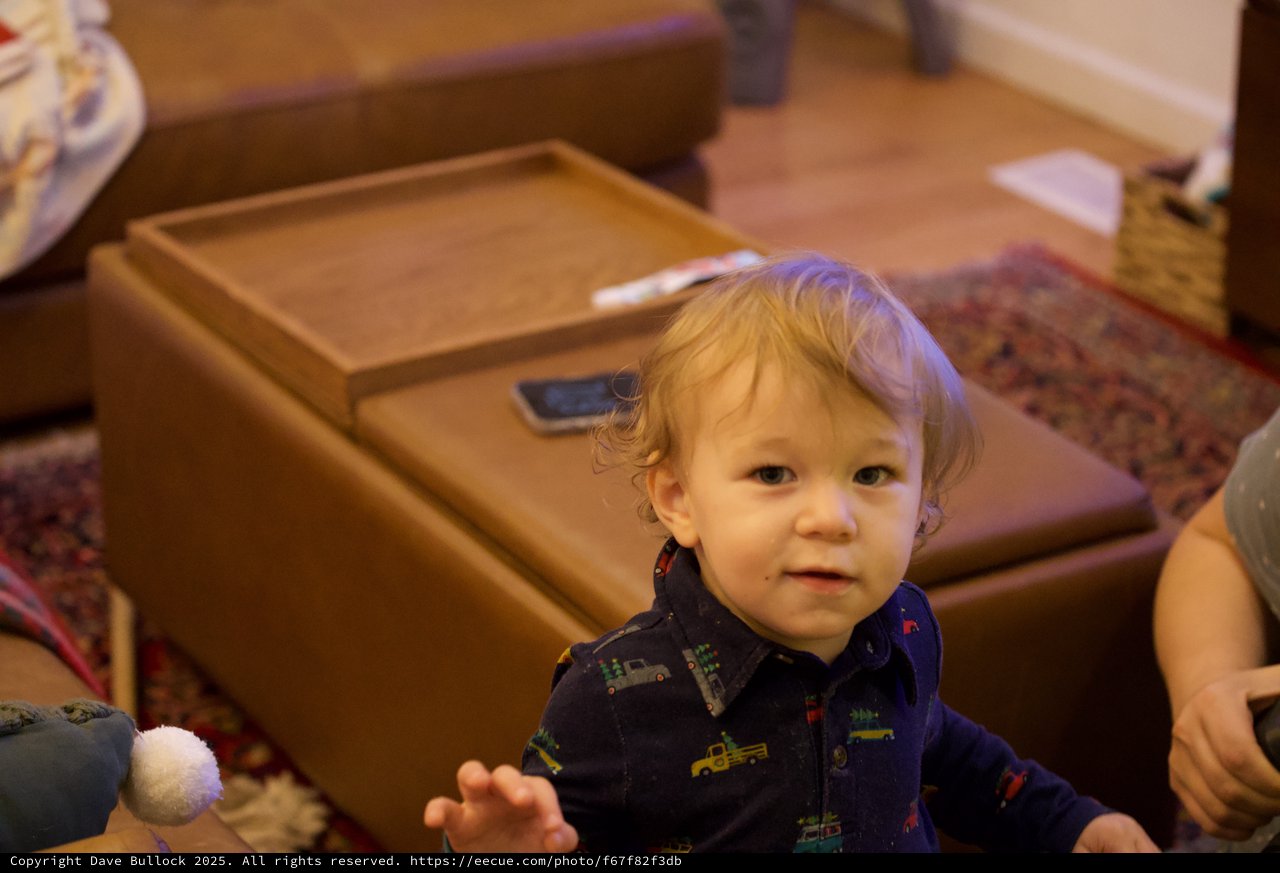 Toddler in Train Pajamas at Christmas Gathering