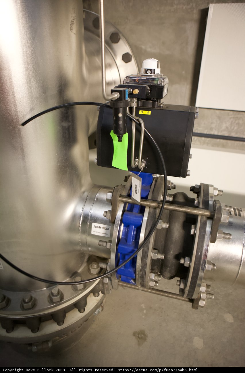 Valve with green wire in a factory