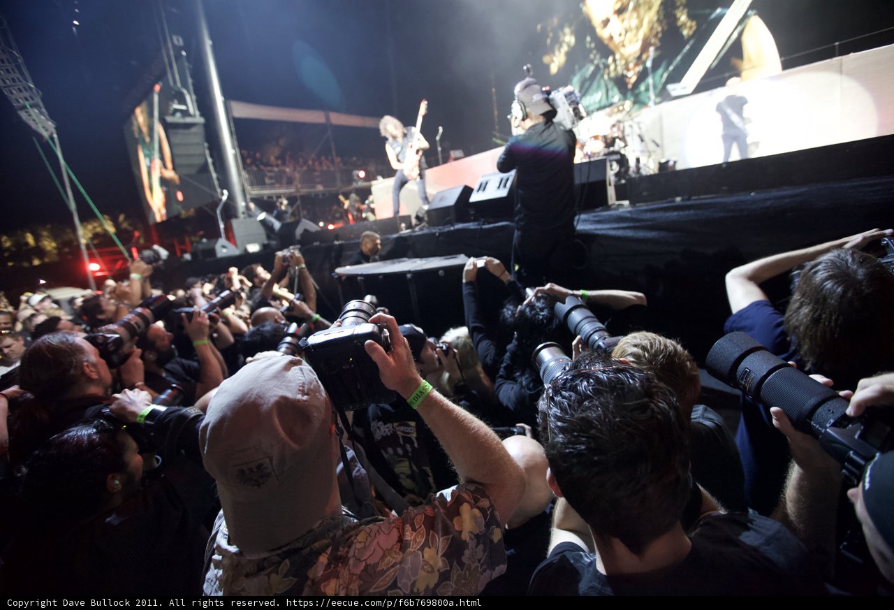 Paparazzi swarm concert crowd