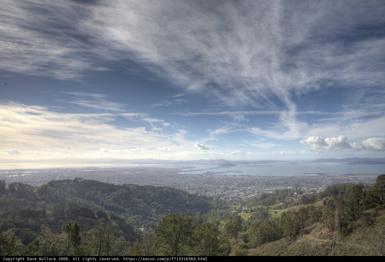 Serene Cityscape and Majestic Mountain View