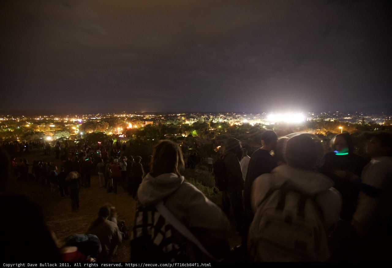 Nighttime Football Game Draws Enthusiastic Crowd