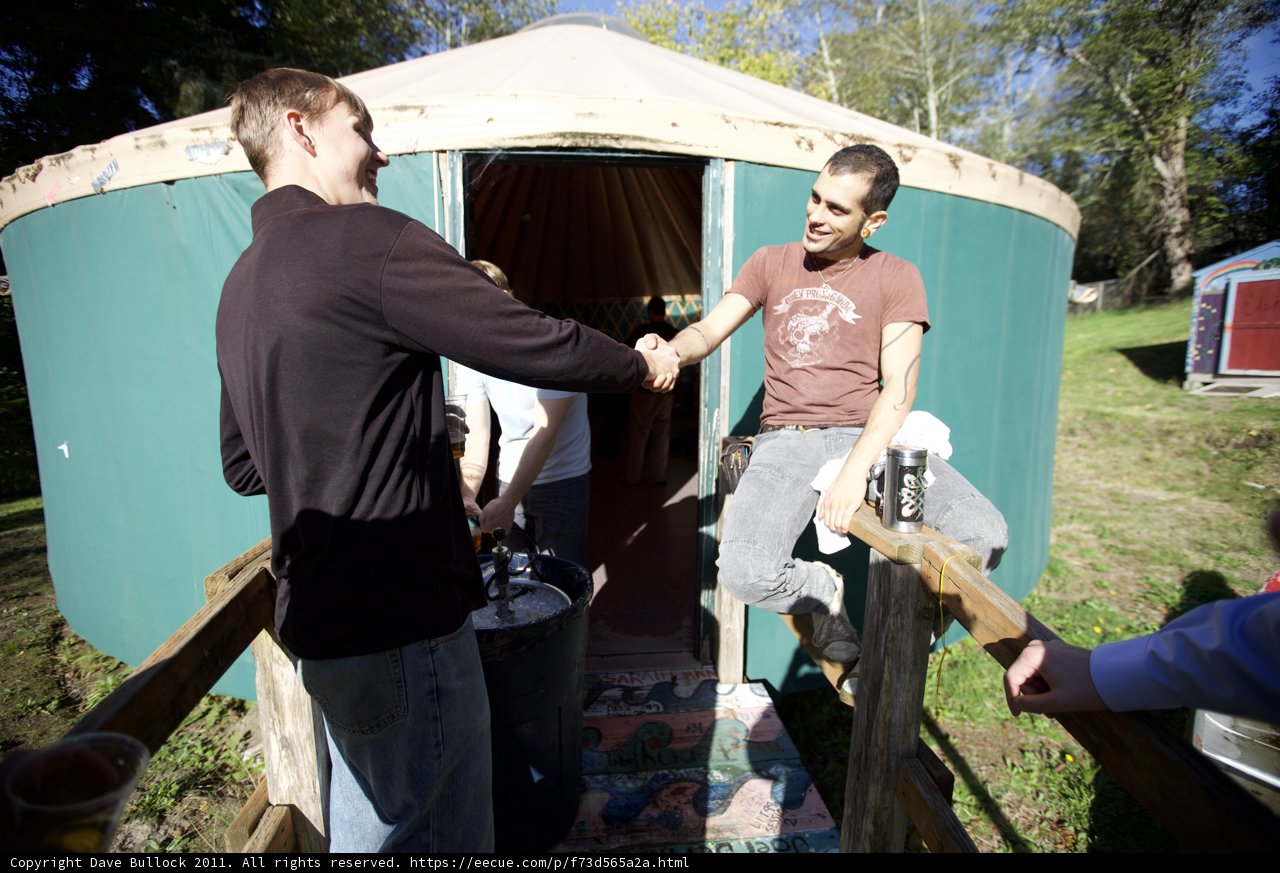 Handshake in Front of a Yurt