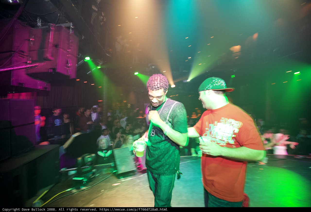 Two Men Take the Stage at an Electric Nightclub Concert
