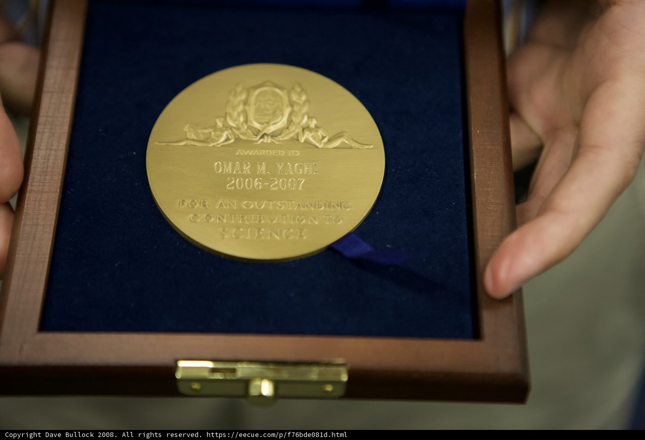 The Gold Medal in Its Wooden Home