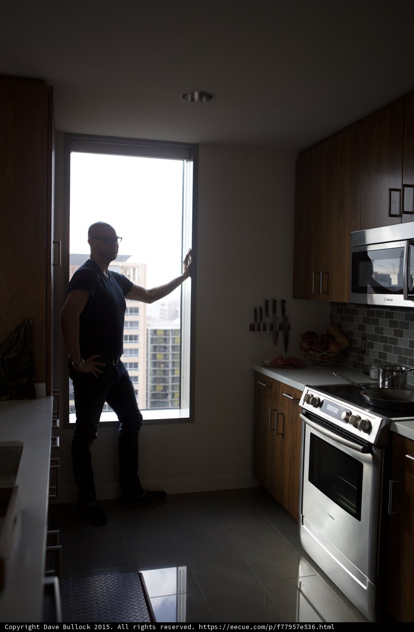 Hand on Window Kitchen Portrait