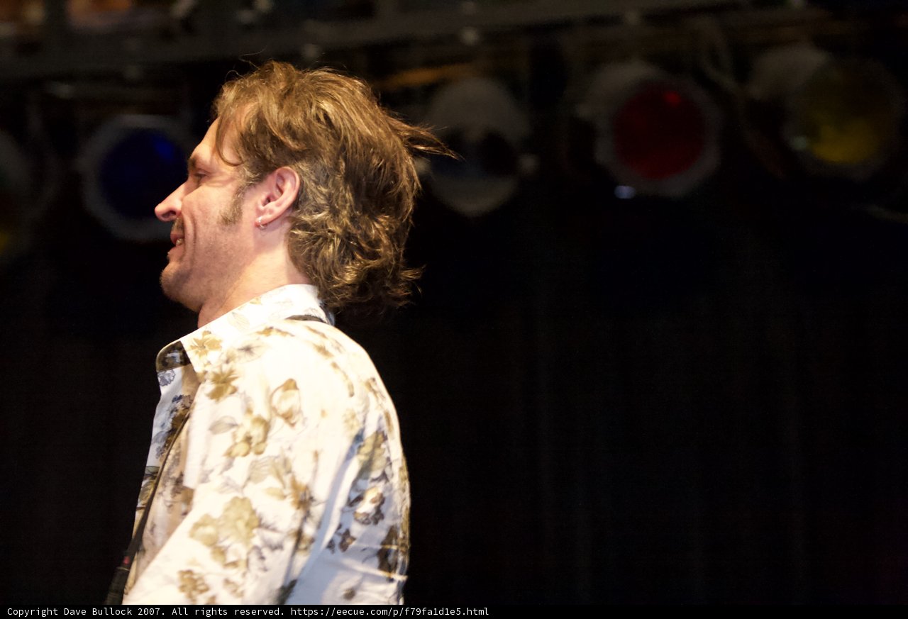 Man in Floral Shirt Performs at Glasshouse