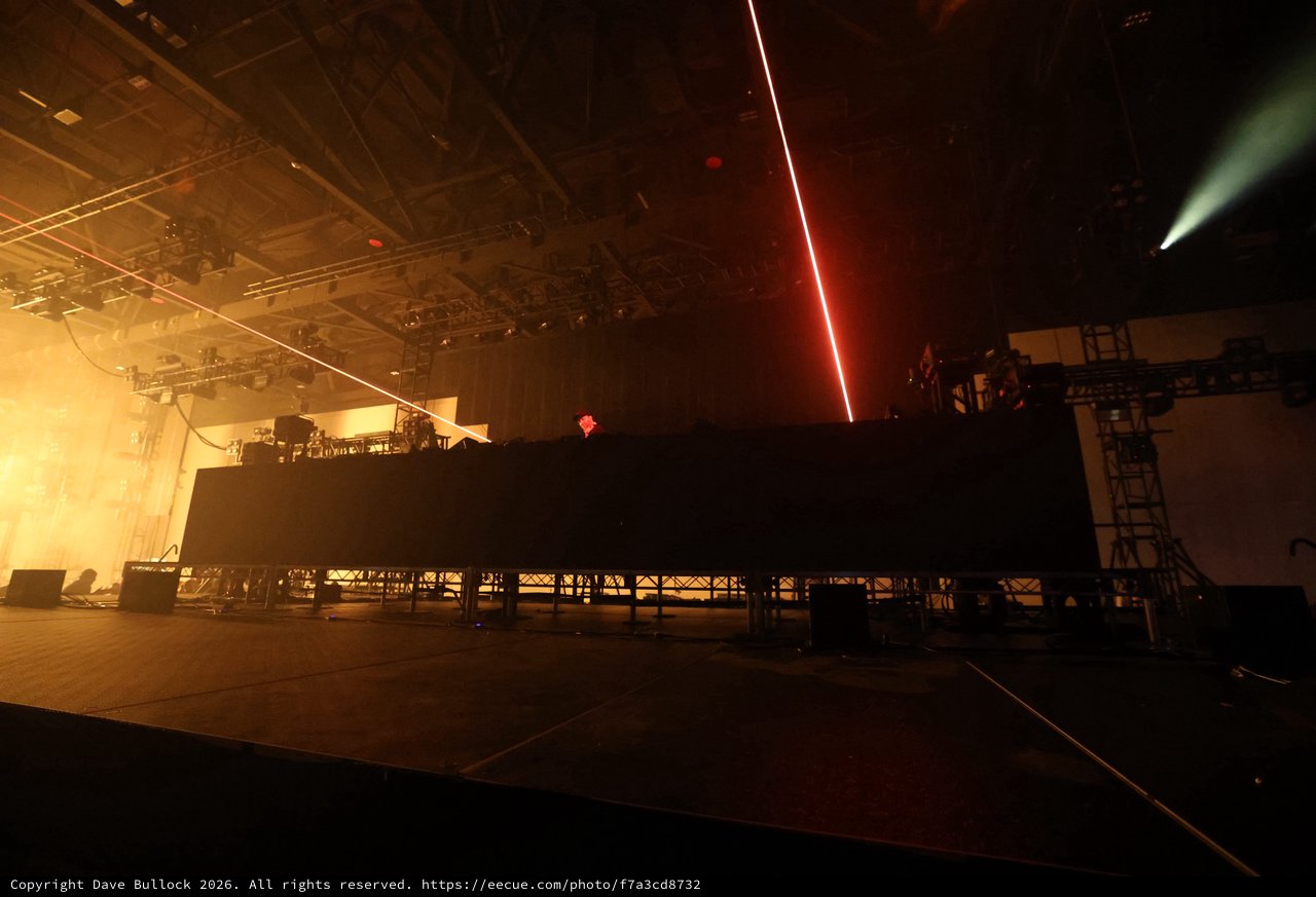 Red Laser Slices Through Smoky EDM Festival Stage