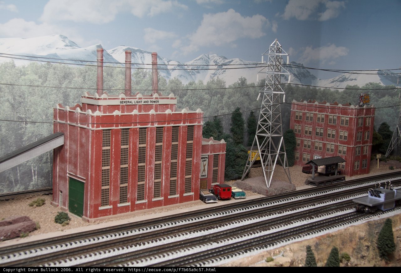 Red Building and Steam Train on Display