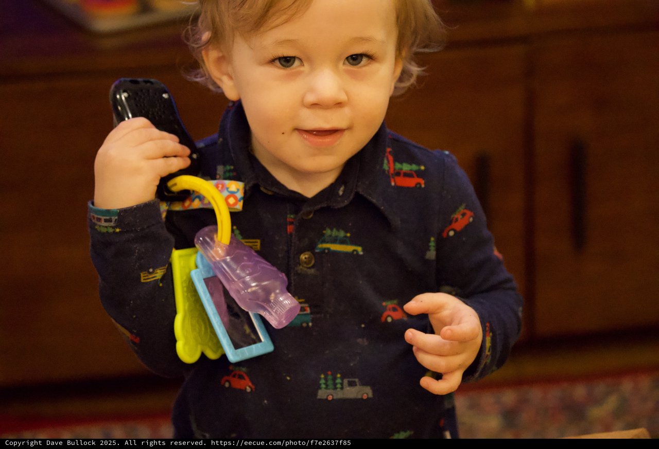 Toddler with Toy Keys on Christmas Morning