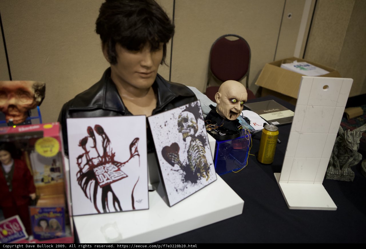 Mannequin Mask and Doll on a Table