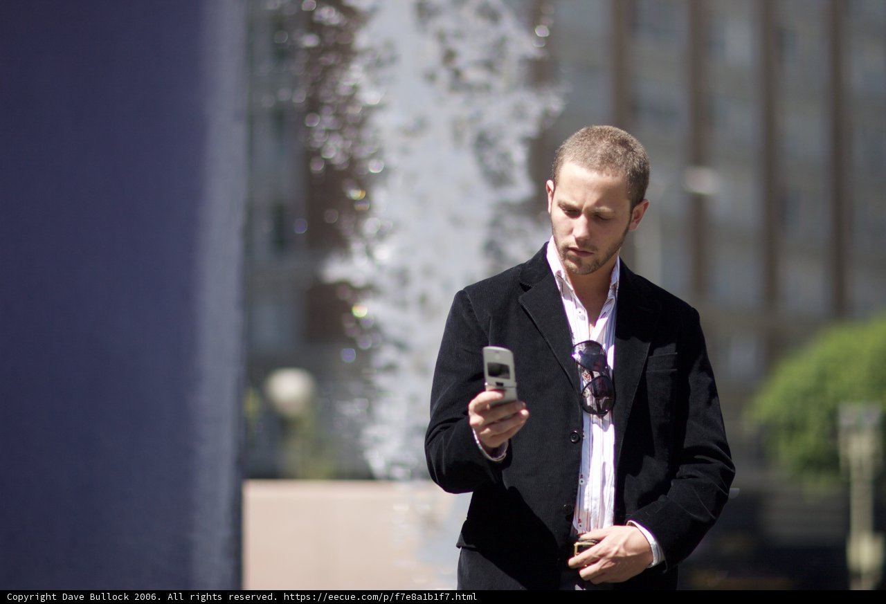 Businessman Checking His Phone