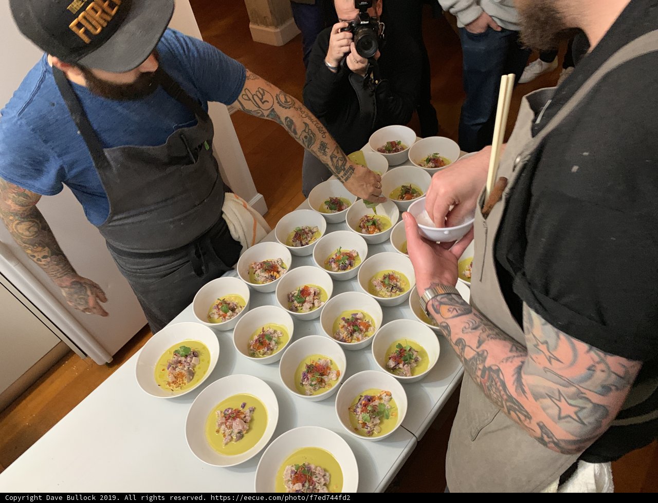 Tattooed Man Serving Brunch