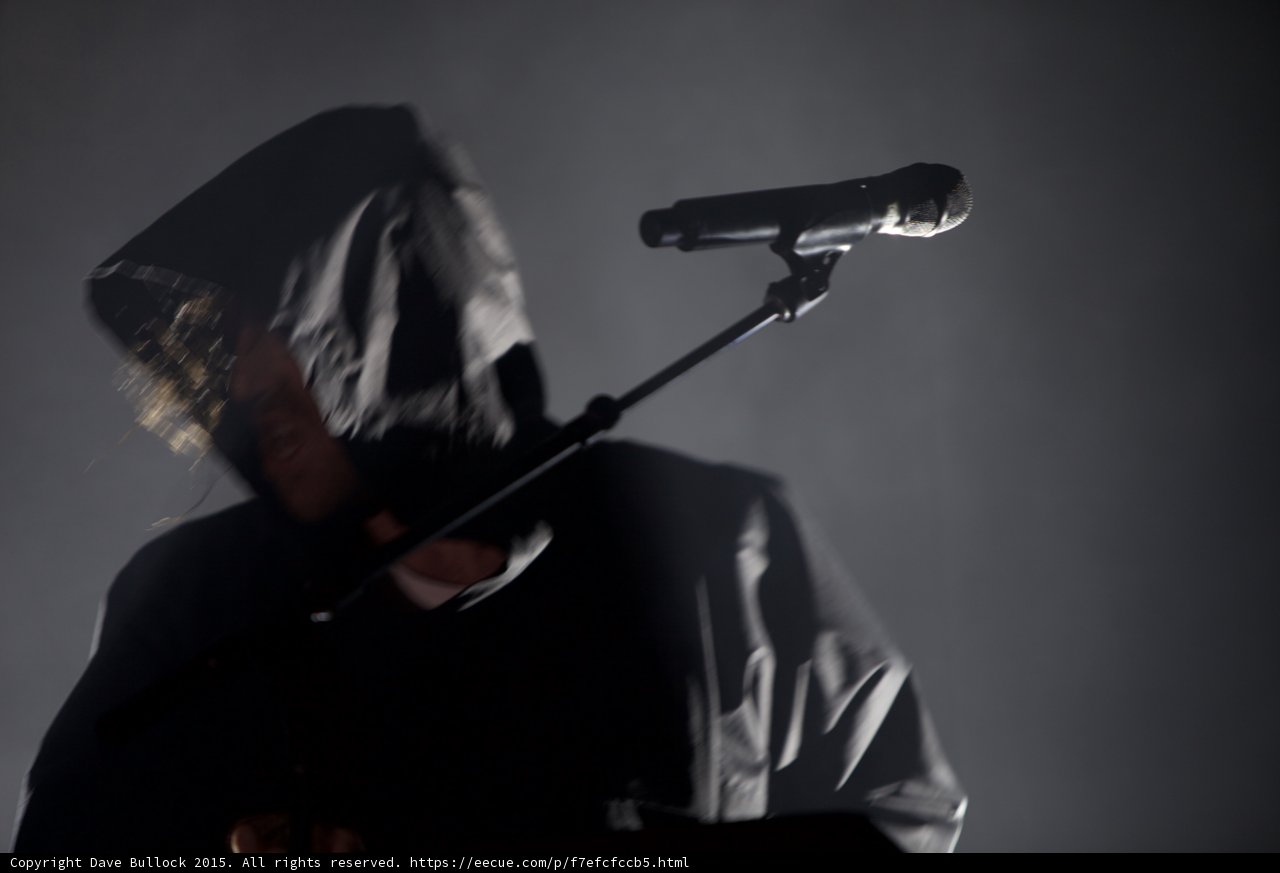 Hooded Performer Close-up