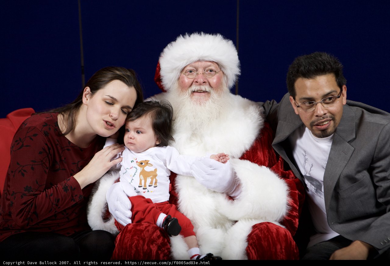 A Festive Family Portrait with Santa