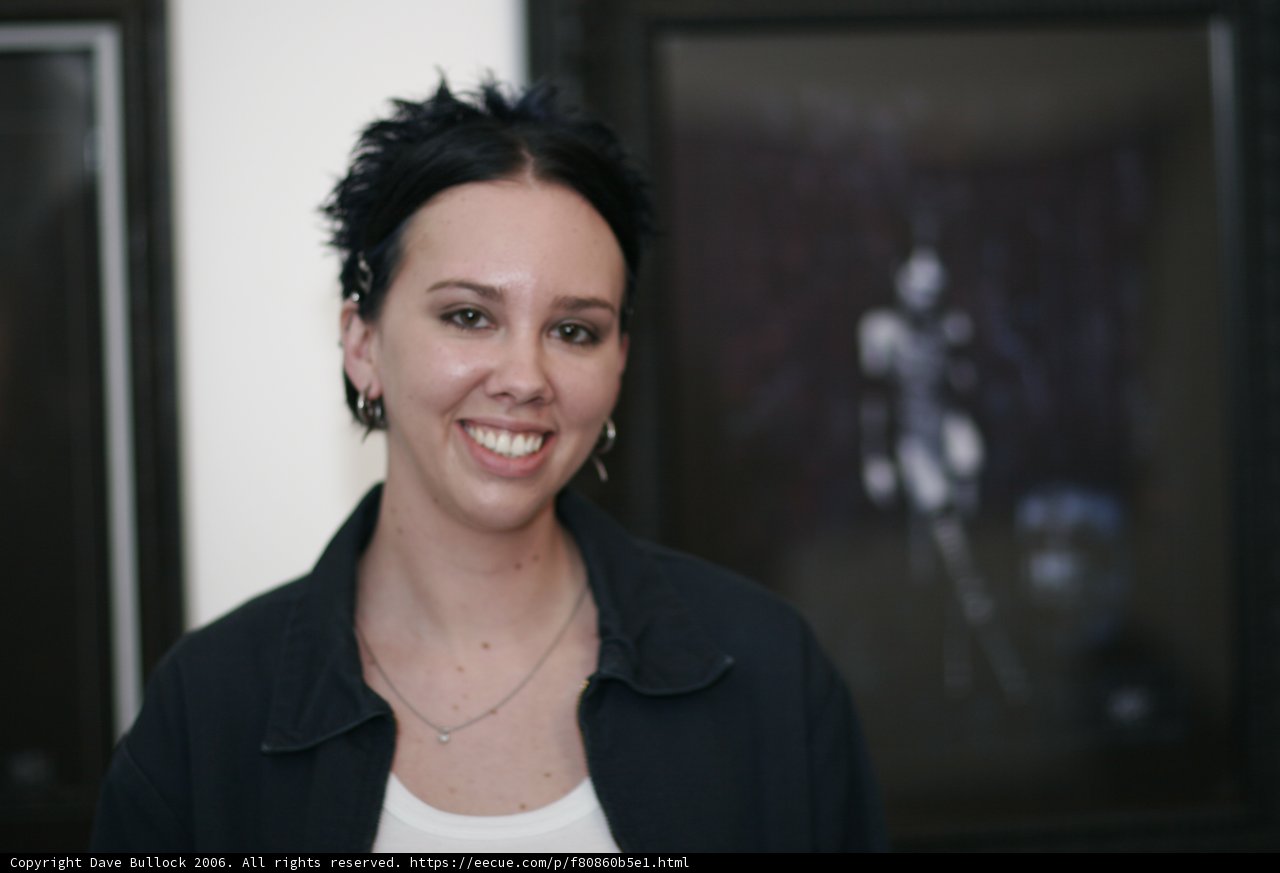 Smiling Woman in Black Jacket