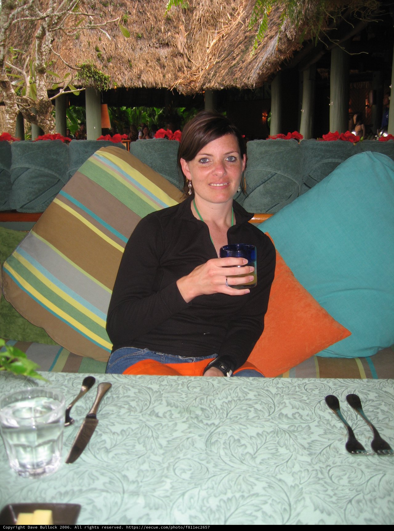 Woman Relaxing at Tropical Resort Outdoor Lounge