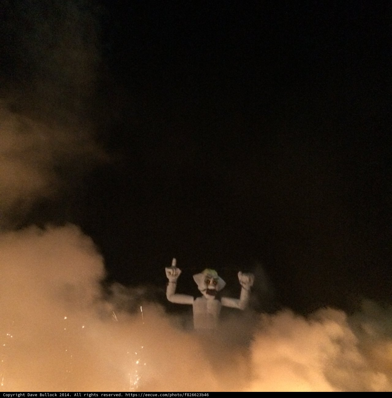 White Statue Shines Under Night Sky