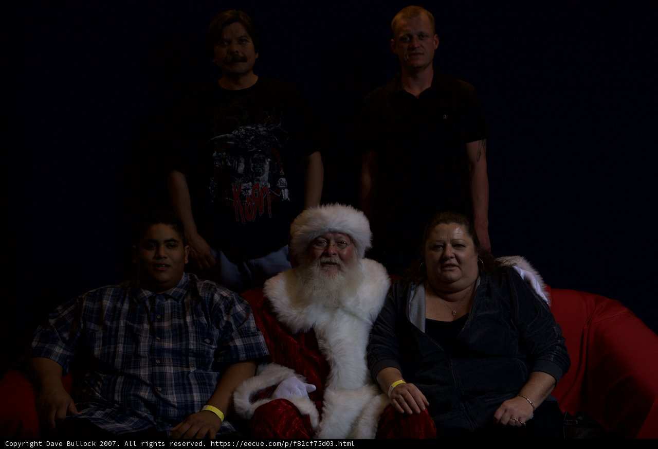 Festive Group Photo with Santa Claus