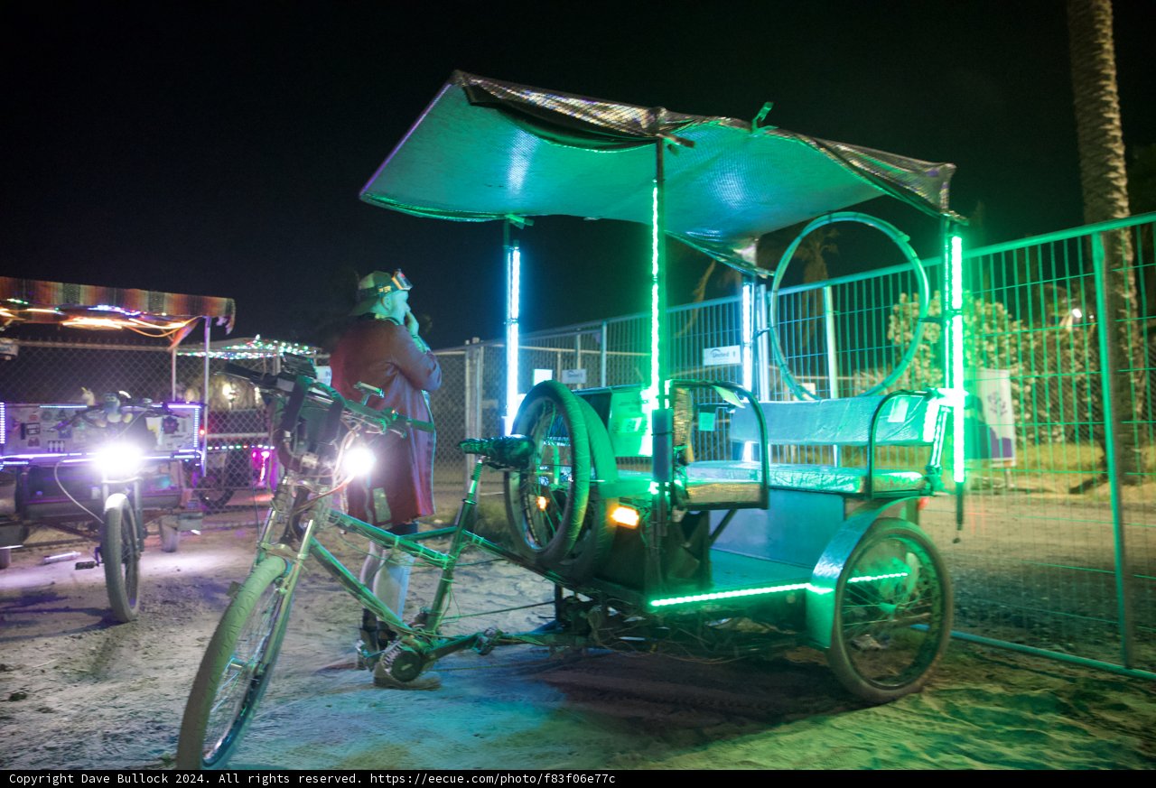 Illuminated Tricycle at Coachella 2024: A Nighttime Adventure