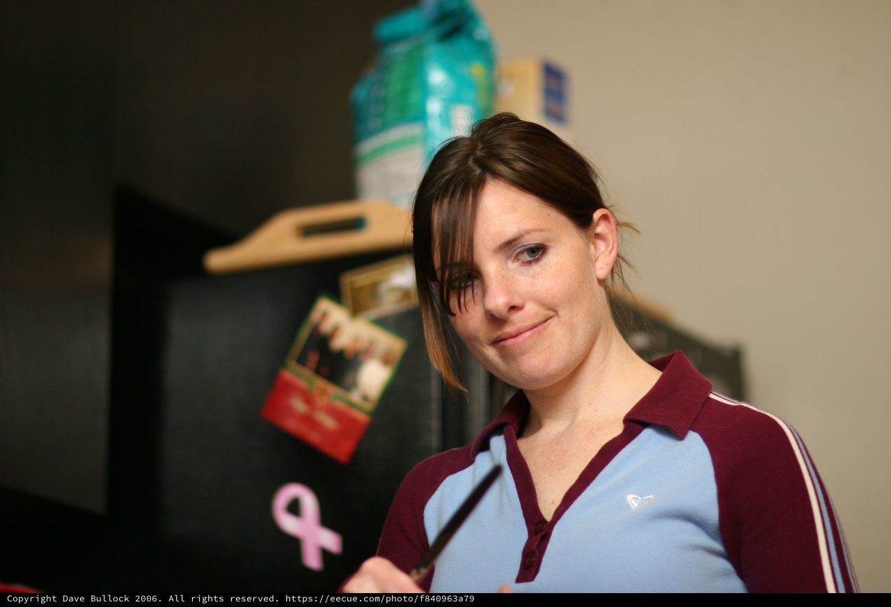Candid Kitchen Moment with a Subtle Smile