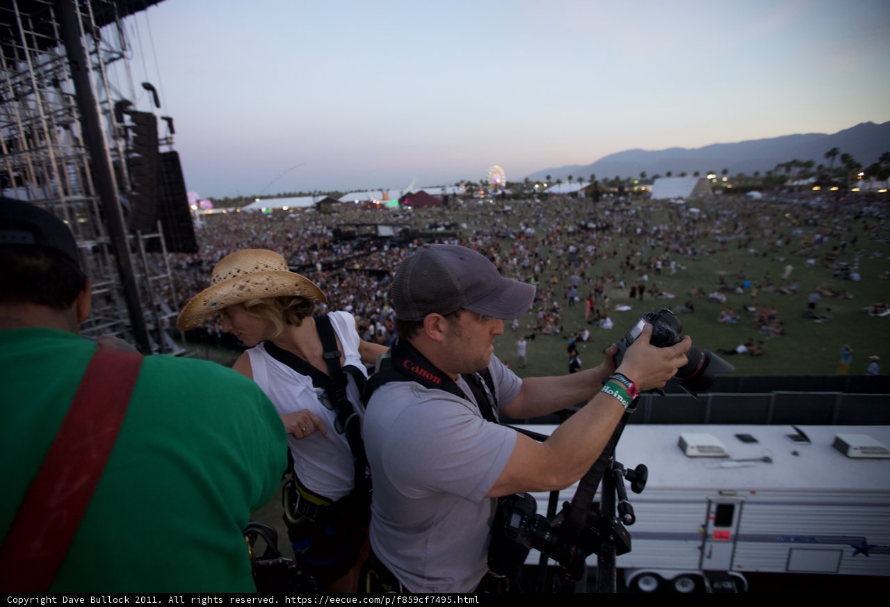 Capturing the Energy: Photographer Framing the Concert Crowd