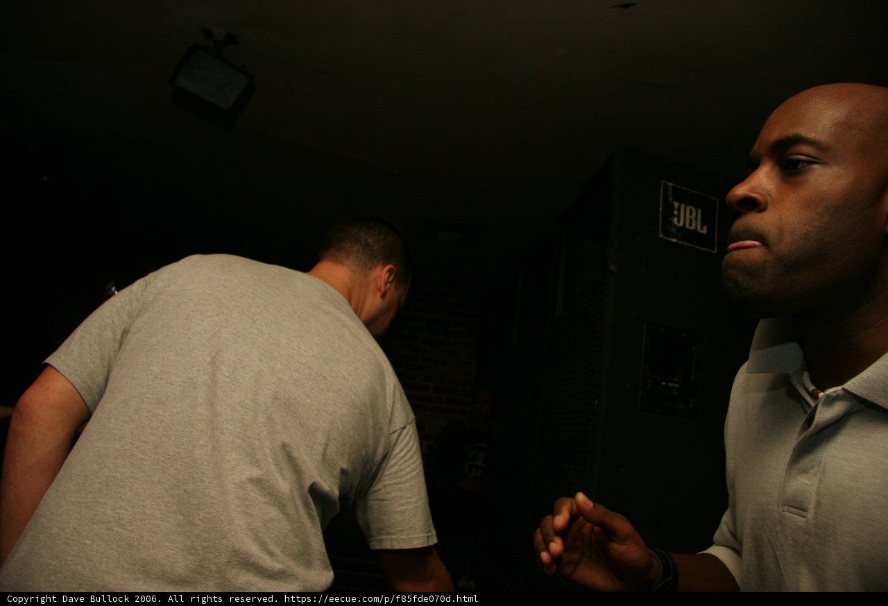 Two Men in Grey and White